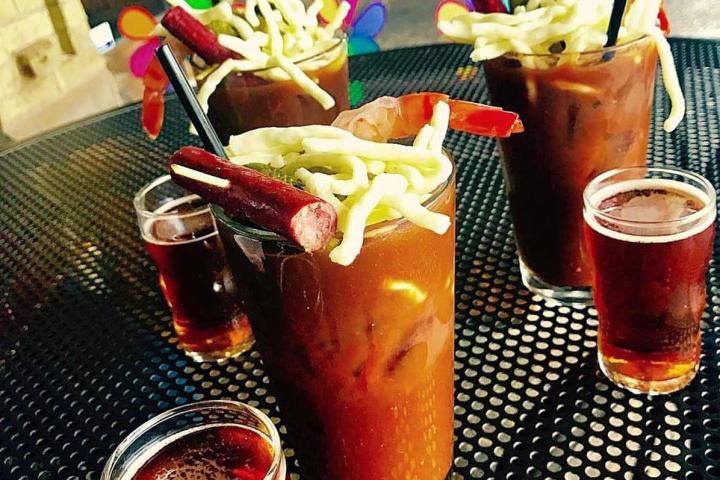 a plate of food and a drink on a table